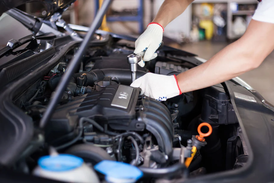 Mechanic working on engine